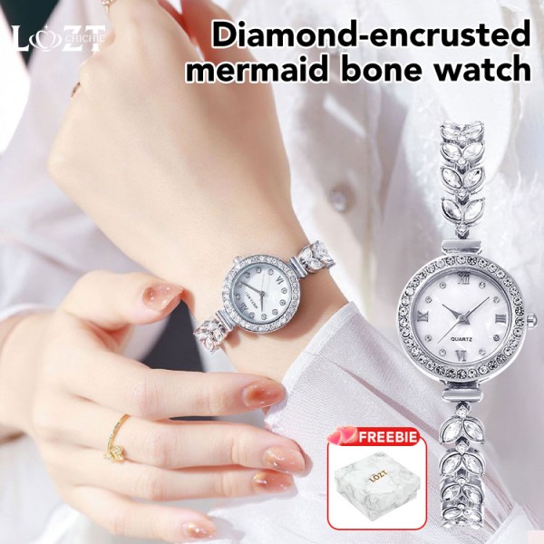 Diamond-encrusted mermaid bone watch..